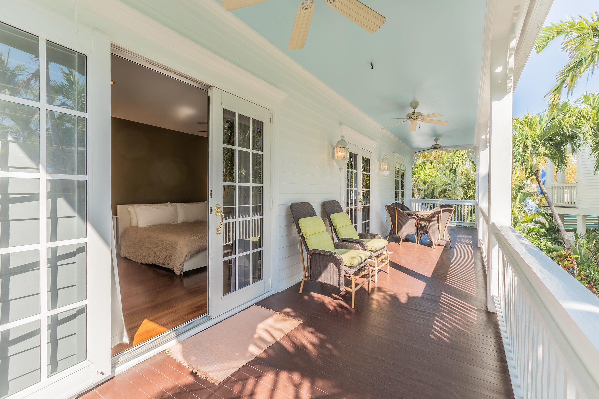 66 Front Street Key West, FL 33040 - Photo 5 of 8 a living room filled with furniture