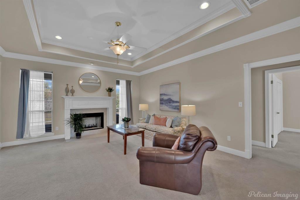 1413 Magnolia Ridge Bossier City, LA 71112 - Photo 12 of 29 a living room with furniture and a fireplace