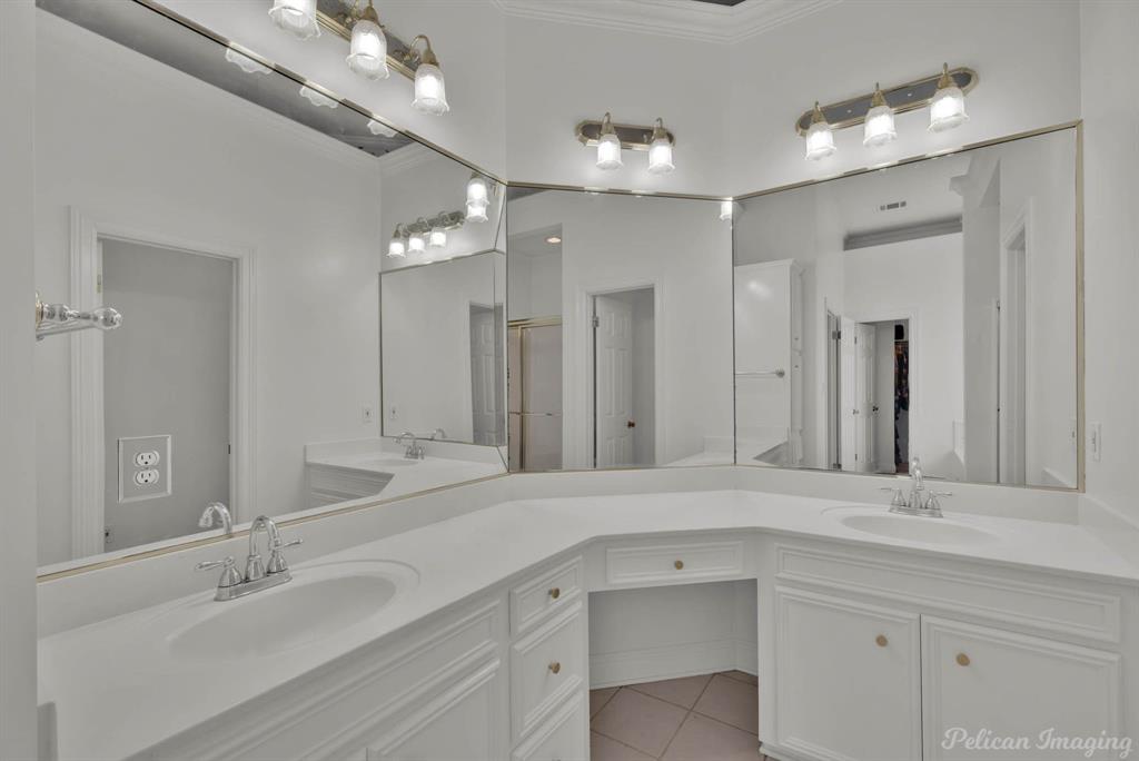 1413 Magnolia Ridge Bossier City, LA 71112 - Photo 21 of 29 a bathroom with a sink double vanity and a mirror