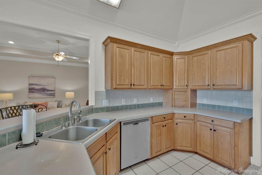 1413 Magnolia Ridge Bossier City, LA 71112 - Photo 23 of 29 a kitchen with a sink cabinets and window