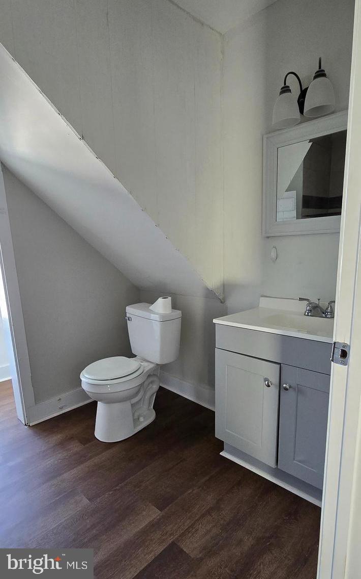29 North Main Street, Unit B Smithsburg, MD 21783 - Photo 3 of 15 a bathroom with a toilet sink and mirror