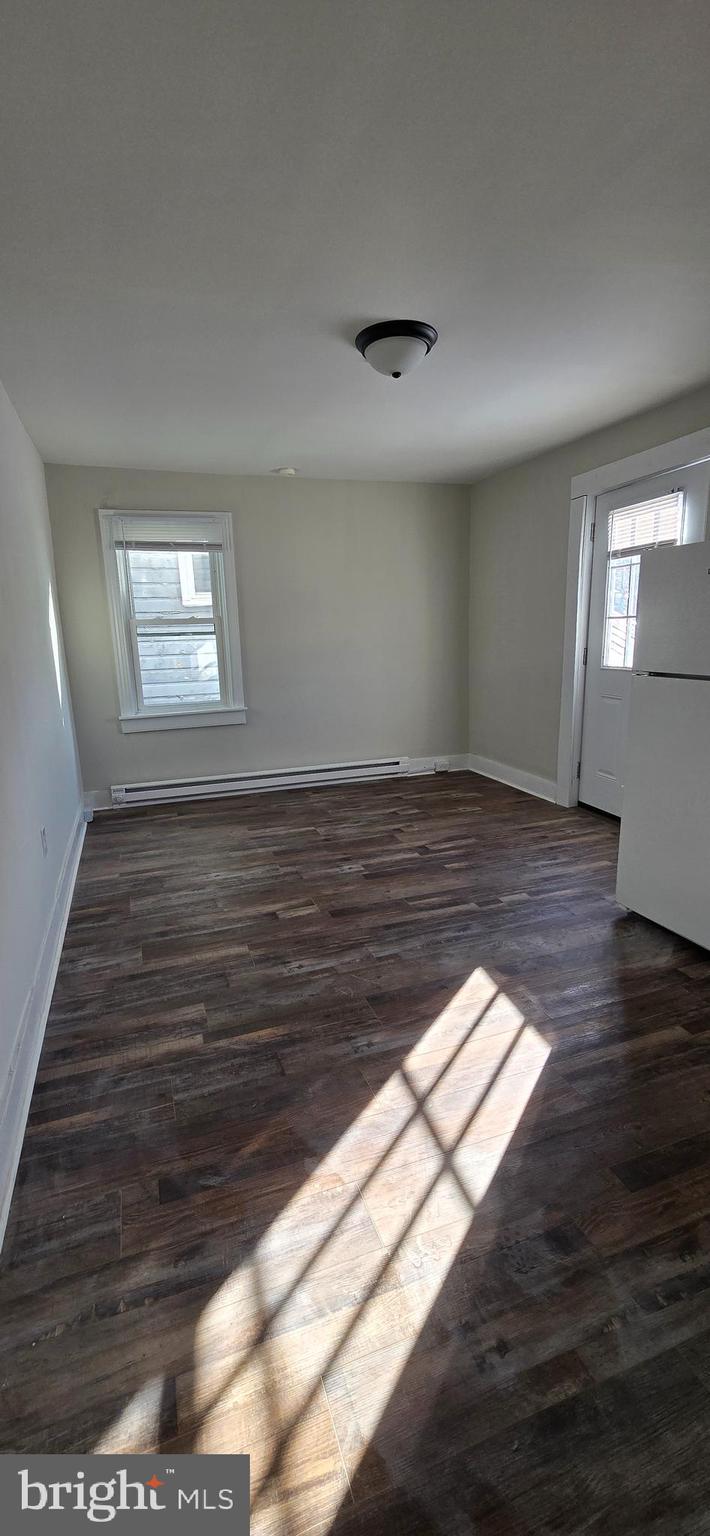29 North Main Street, Unit B Smithsburg, MD 21783 - Photo 6 of 15 a view of an empty room and wooden floor