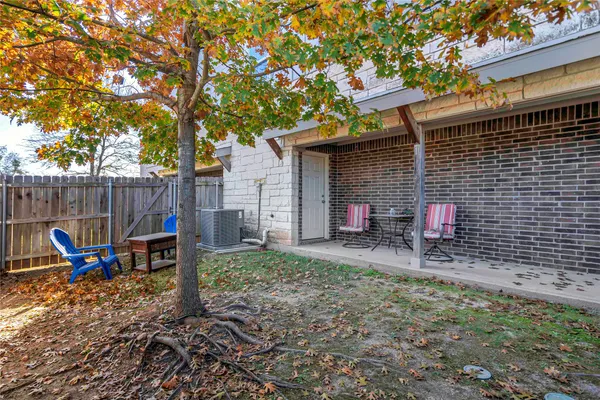 a house with trees in front of it