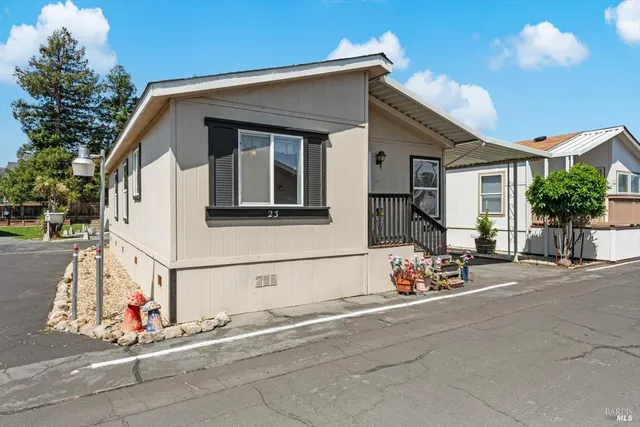a front view of a house with outdoor space