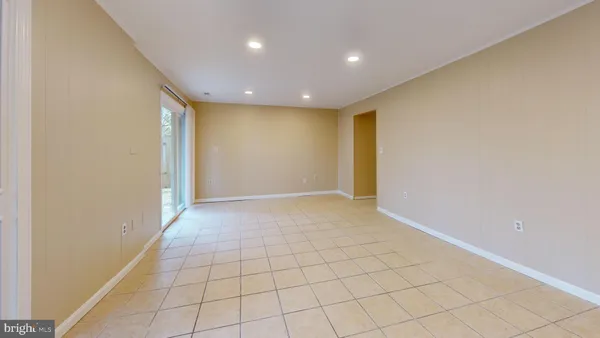 a view of hallway with a large window