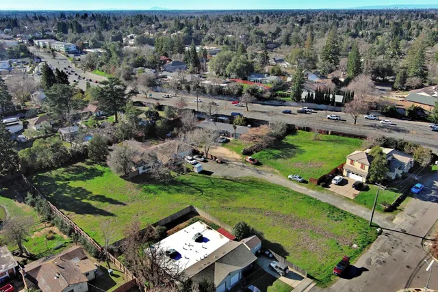 an aerial view of a house with a garden