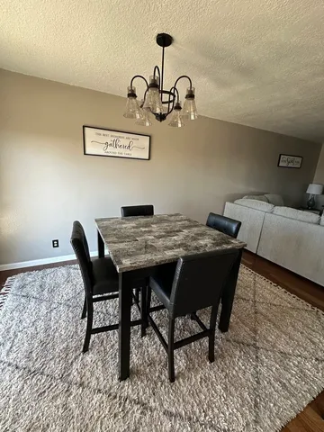 a view of a dining room with furniture