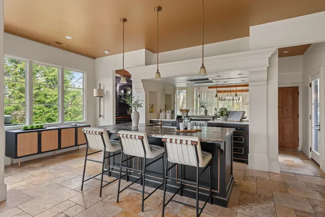 a kitchen with a sink stove and refrigerator
