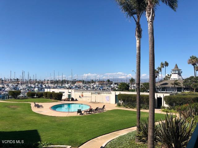 3101 Peninsula Road, Unit 104 Oxnard, CA 93035 - Photo 2 of 29 a view of a lake with a big yard