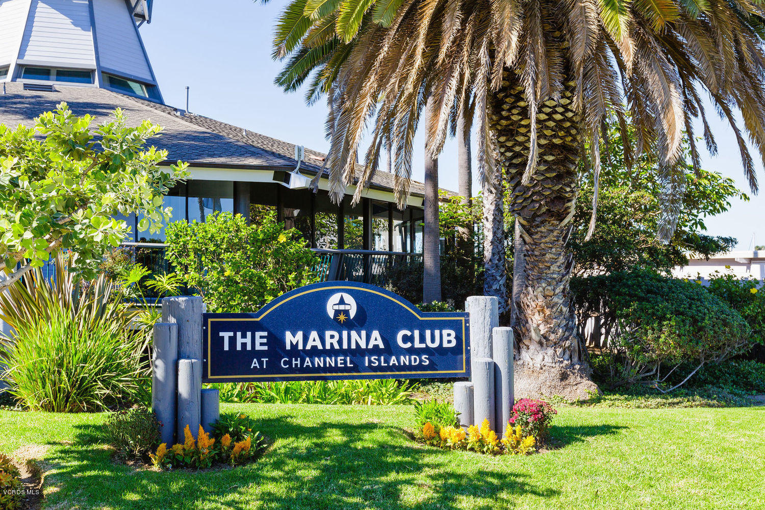 3101 Peninsula Road, Unit 104 Oxnard, CA 93035 - Photo 16 of 29 a view of a sign board with a yard