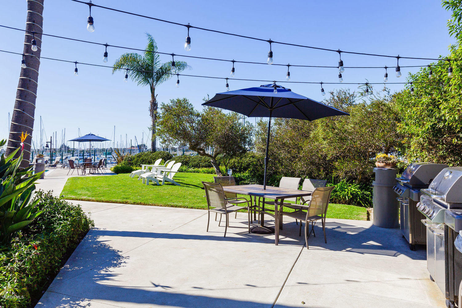 3101 Peninsula Road, Unit 104 Oxnard, CA 93035 - Photo 20 of 29 a view of a chair and table in the garden