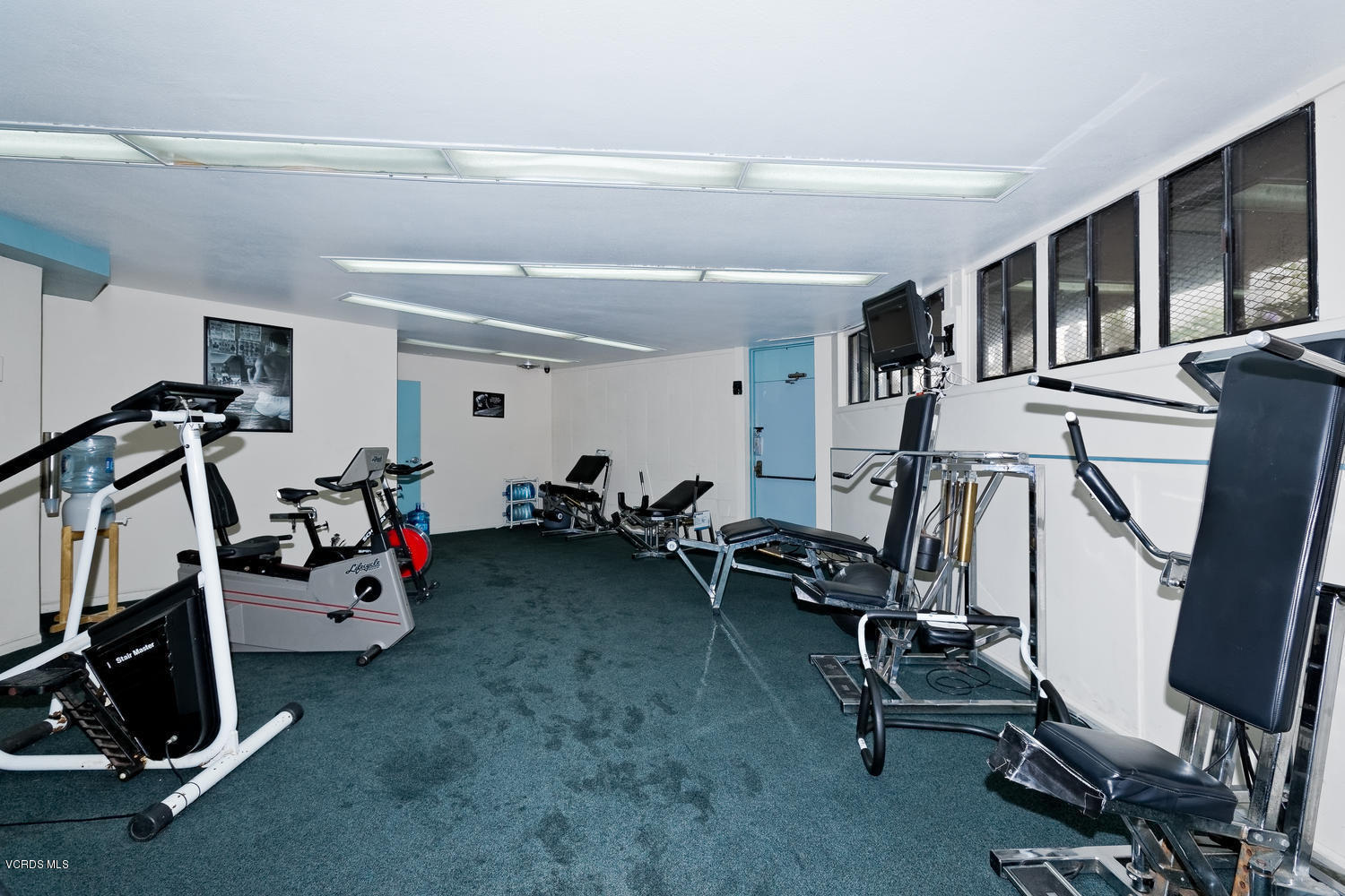 3101 Peninsula Road, Unit 104 Oxnard, CA 93035 - Photo 22 of 29 a view of a room with gym equipment