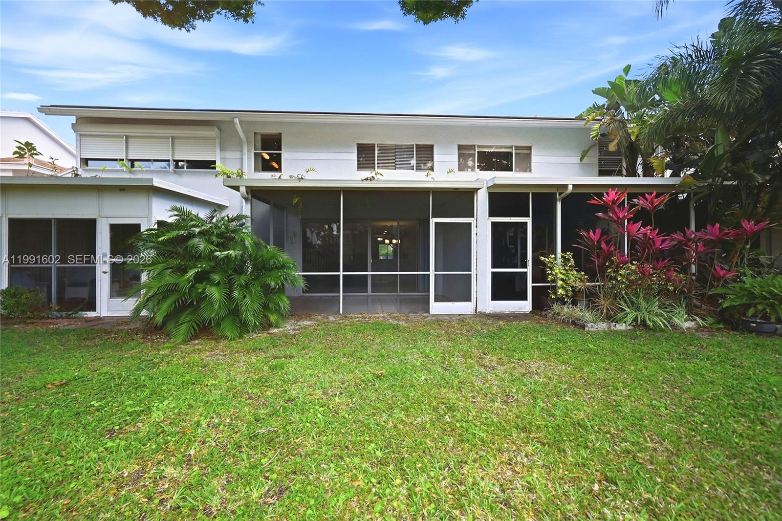 6215 Old Court Road, Unit 505 Boca Raton, FL 33433 - Photo 35 of 36 a view of a house with a garden