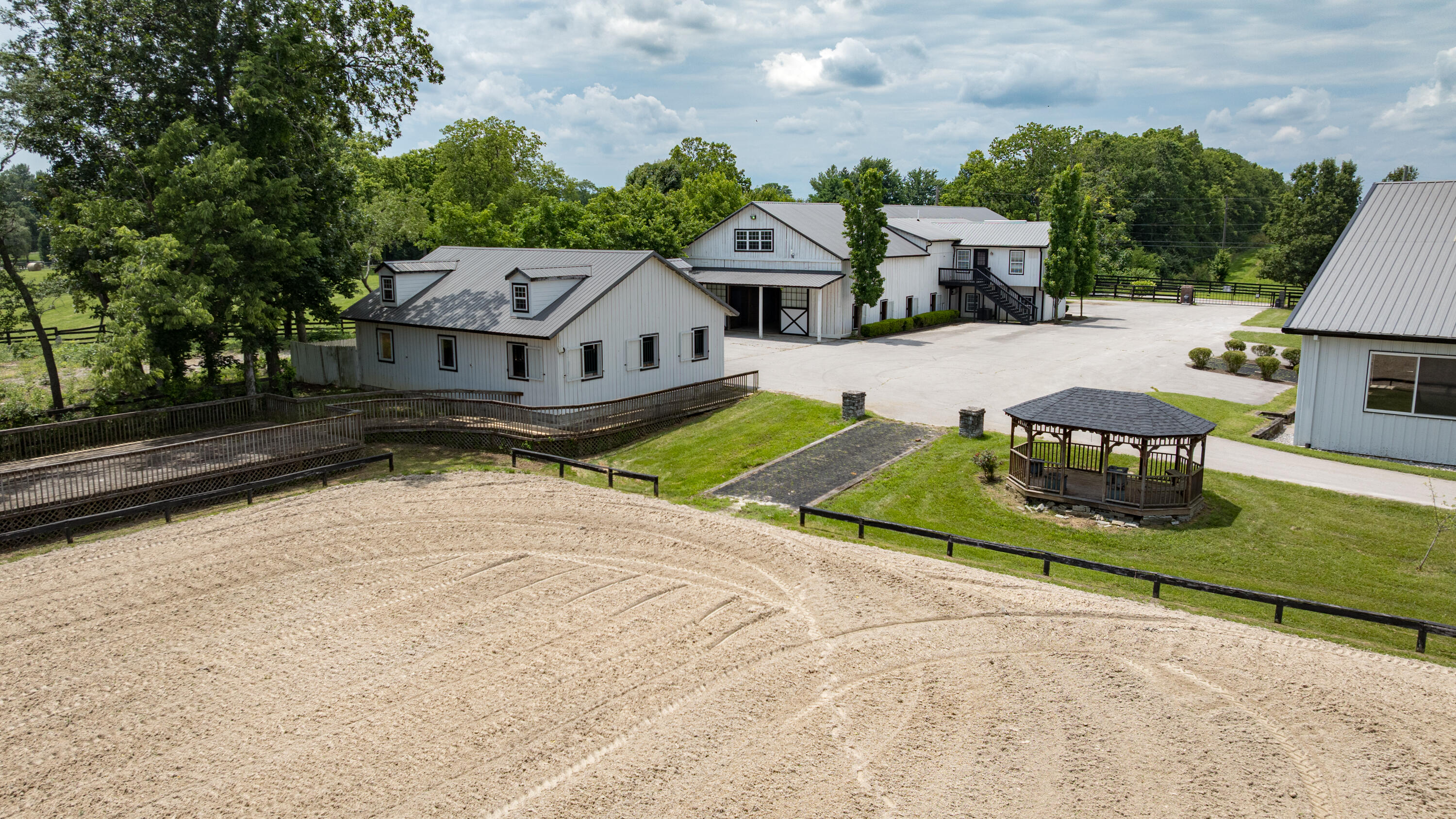 4845 Bryan Station Road Lexington, KY 40516 - Photo 17 of 115 Barn 1 and auxiliary barn overlook smaller outdoor arena