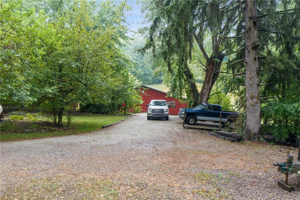 265 Labelle Road East Millsboro, PA 15433 - Photo 4 of 38 DRIVEWAY TO OVERSIZED GARAGE