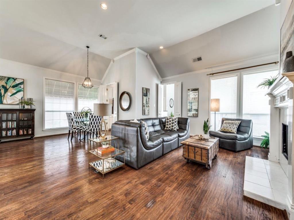 4007 Kirkmeadow Lane Dallas, TX 75287 - Photo 5 of 18 a living room with furniture and a large window
