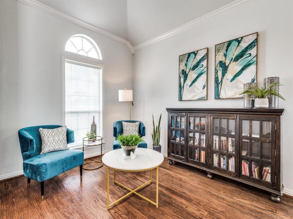 4007 Kirkmeadow Lane Dallas, TX 75287 - Photo 6 of 18 a view of a livingroom with furniture and wooden floor