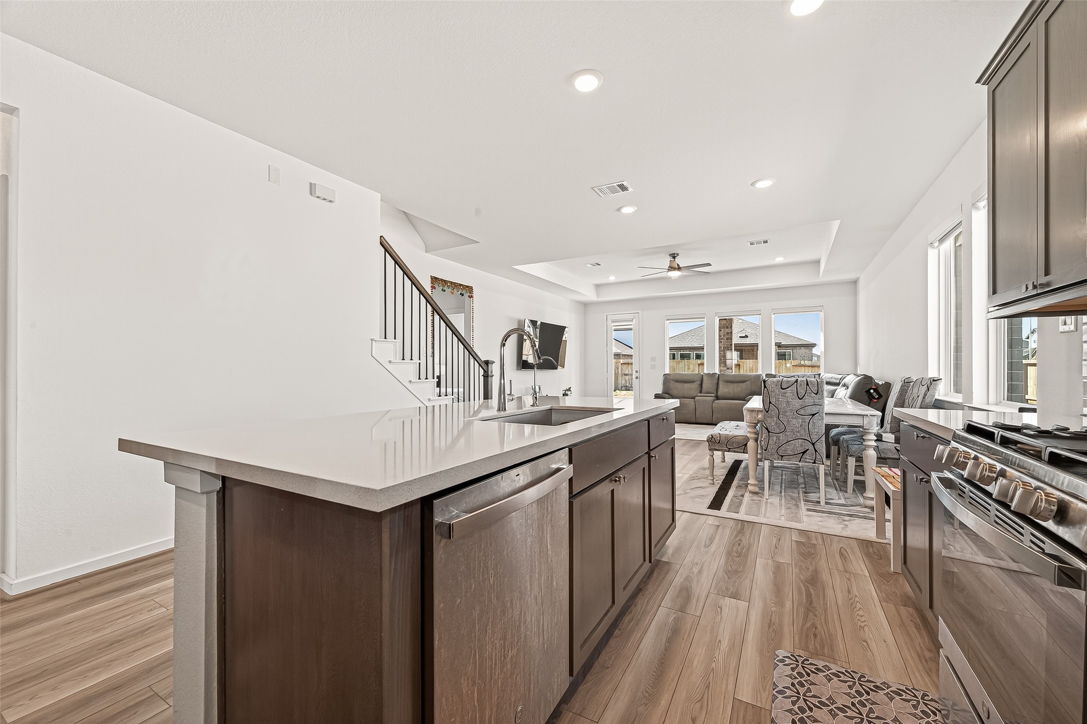 9747 Pettus Crk Drive Cypress, TX 77433 - Photo 22 of 48 a kitchen with lots of counter top space and stainless steel appliances
