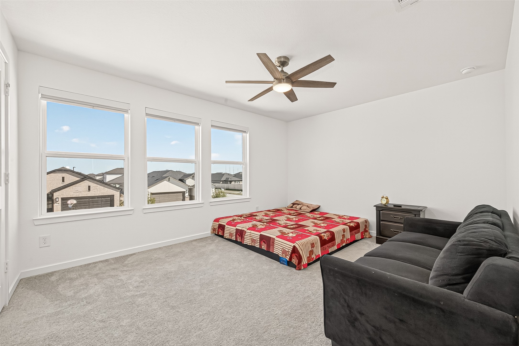 9747 Pettus Crk Drive Cypress, TX 77433 - Photo 35 of 48 a bedroom with furniture and windows