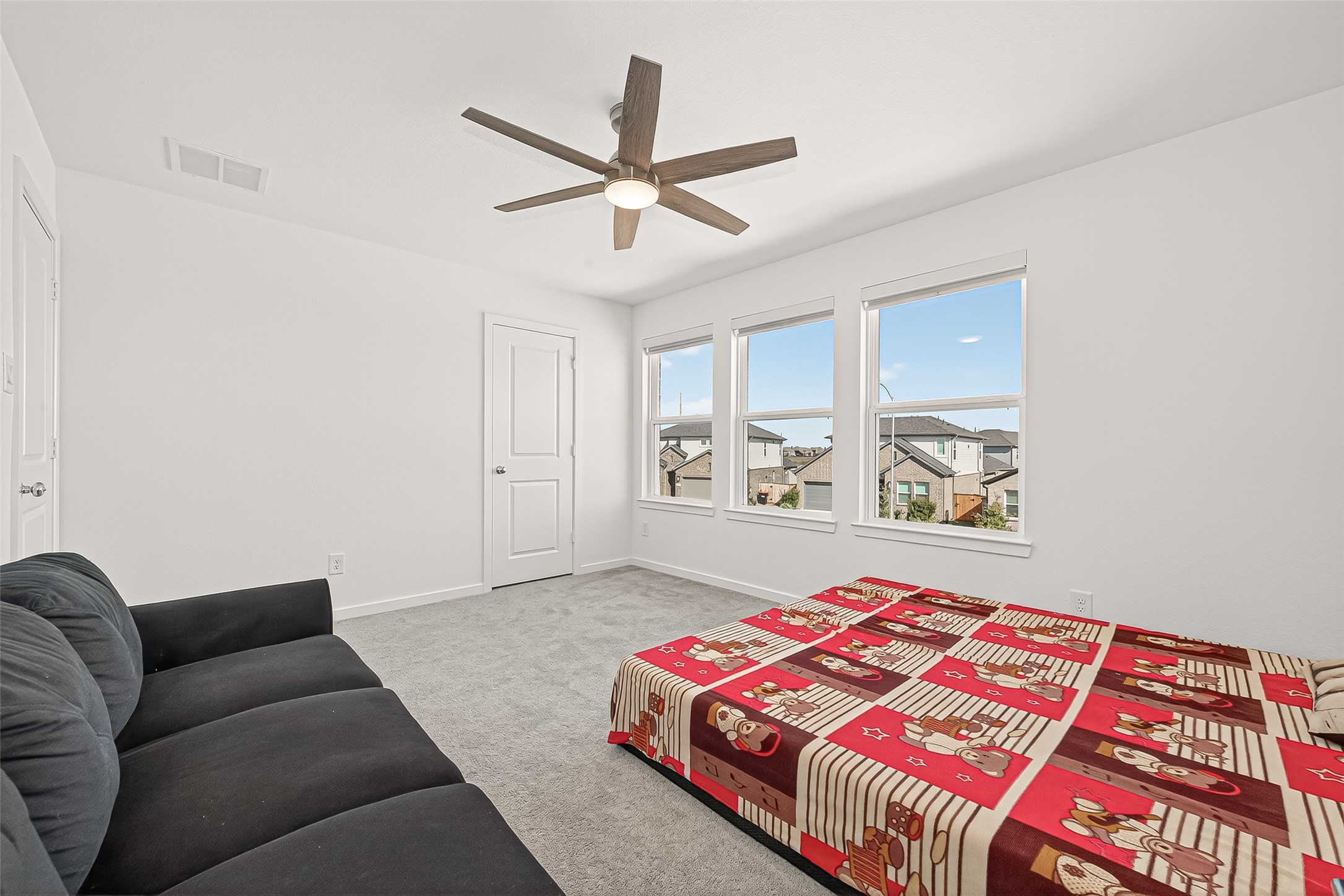 9747 Pettus Crk Drive Cypress, TX 77433 - Photo 37 of 48 a bedroom with a bed and window