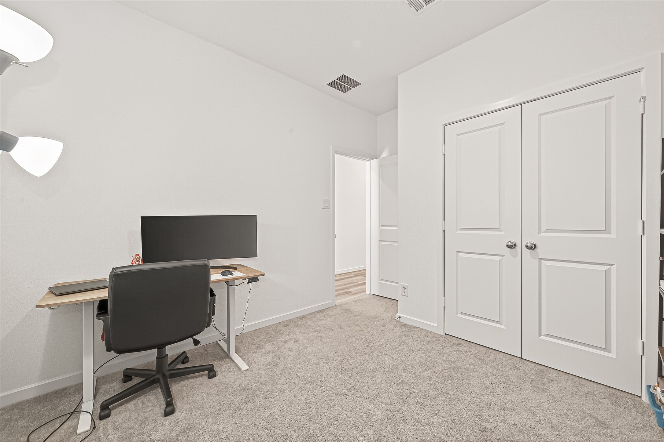 9747 Pettus Crk Drive Cypress, TX 77433 - Photo 42 of 48 a view of workspace with lounge chair