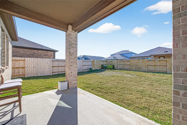 a view of a porch in front of house