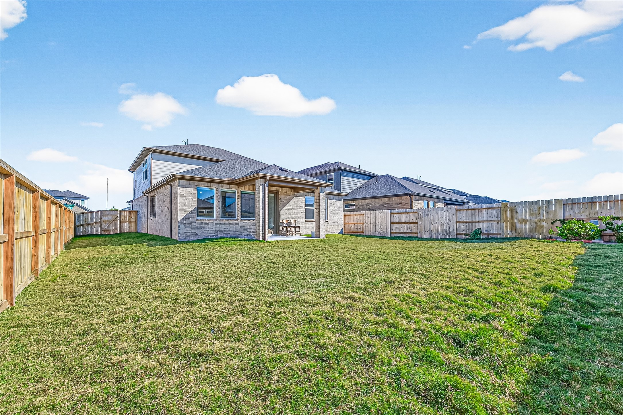 9747 Pettus Crk Drive Cypress, TX 77433 - Photo 48 of 48 a view of a house with a big yard and large trees