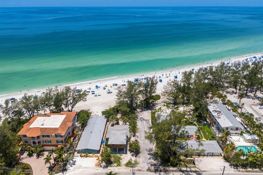 3720 Gulf Drive Holmes Beach, FL 34217 - Photo 5 of 10 a view of a lake with a houses