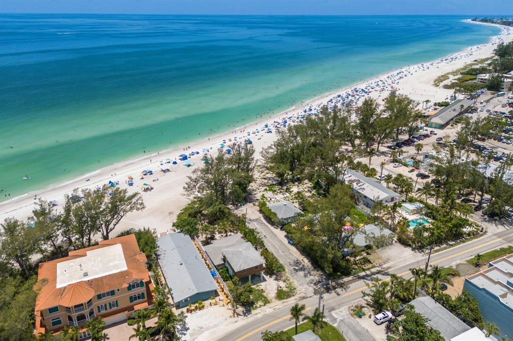 3720 Gulf Drive Holmes Beach, FL 34217 - Photo 6 of 10 a view of a lake with a yard