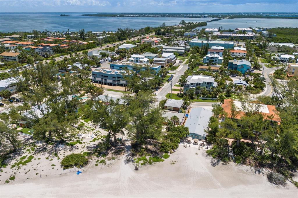 3720 Gulf Drive Holmes Beach, FL 34217 - Photo 7 of 10 an aerial view of multiple house