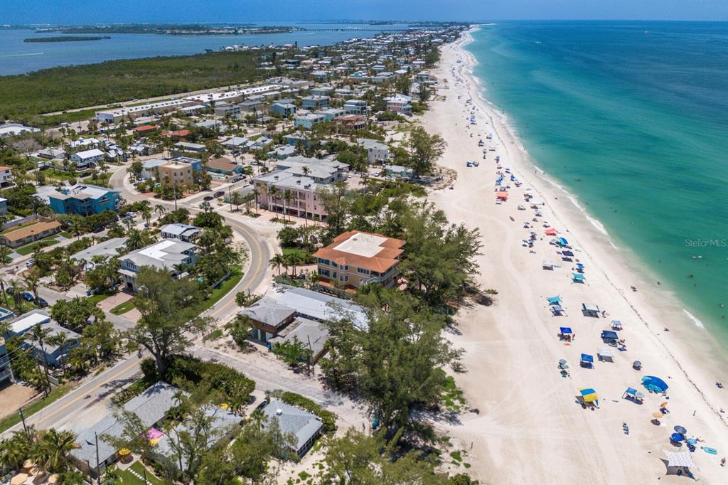 3720 Gulf Drive Holmes Beach, FL 34217 - Photo 8 of 10 an aerial view of residential houses with outdoor space