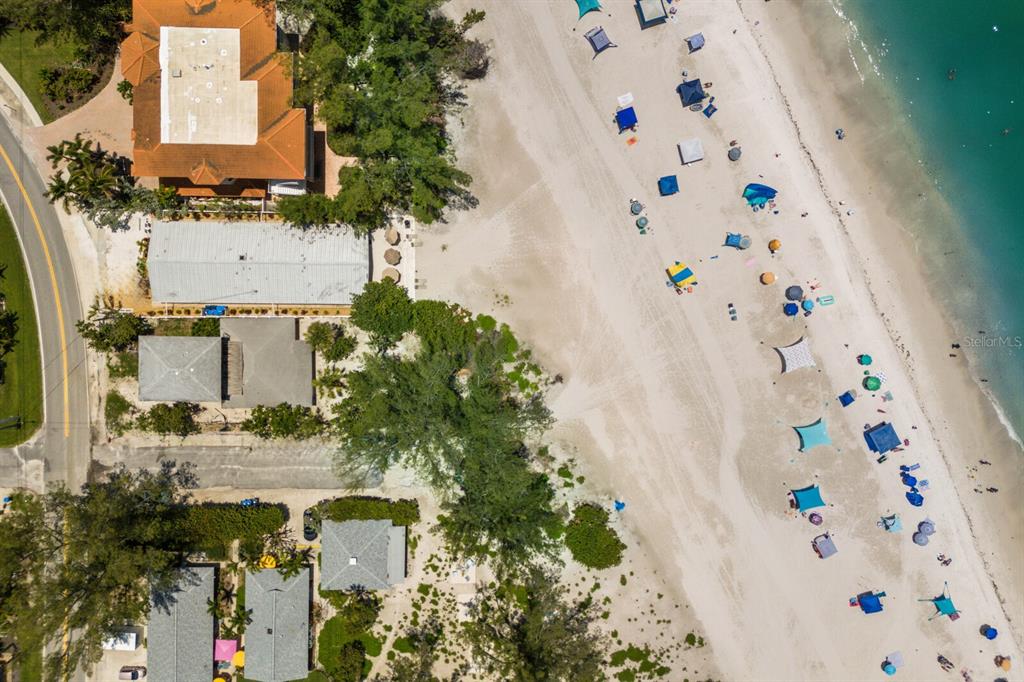 3720 Gulf Drive Holmes Beach, FL 34217 - Photo 9 of 10 an aerial view of residential houses with outdoor space