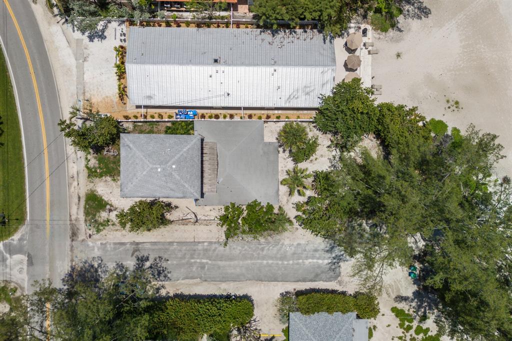3720 Gulf Drive Holmes Beach, FL 34217 - Photo 10 of 10 an aerial view of a house with a yard