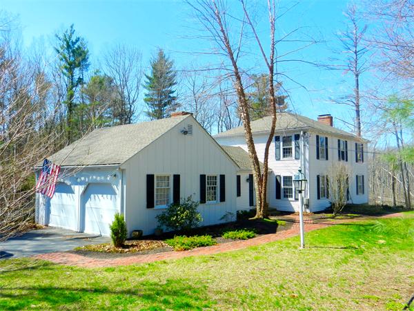 24 Herrick Road Boxford, MA 01921 - Photo 1 of 26 a front view of a house with a yard