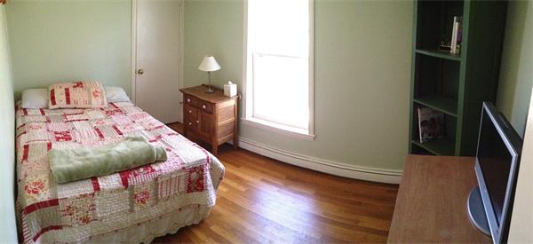 24 Herrick Road Boxford, MA 01921 - Photo 18 of 26 a bedroom with a bed with wooden floor
