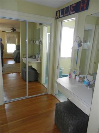 24 Herrick Road Boxford, MA 01921 - Photo 20 of 26 a bathroom with a sink and a mirror
