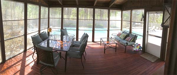 24 Herrick Road Boxford, MA 01921 - Photo 23 of 26 a view of a living room with furniture and floor to ceiling windows