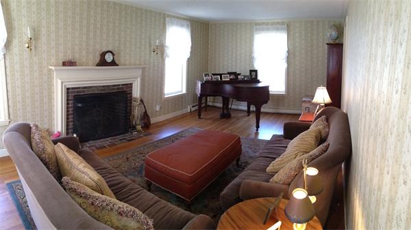 24 Herrick Road Boxford, MA 01921 - Photo 9 of 26 a living room with furniture and a fireplace