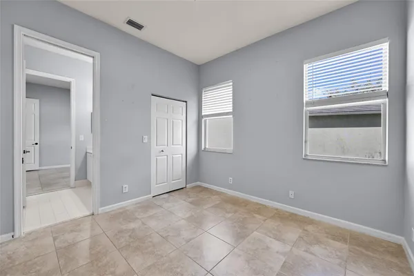 a view of an empty room and window