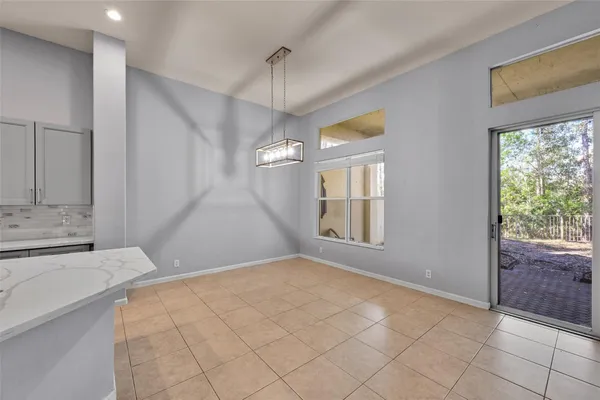 a bedroom with a bed and a sink