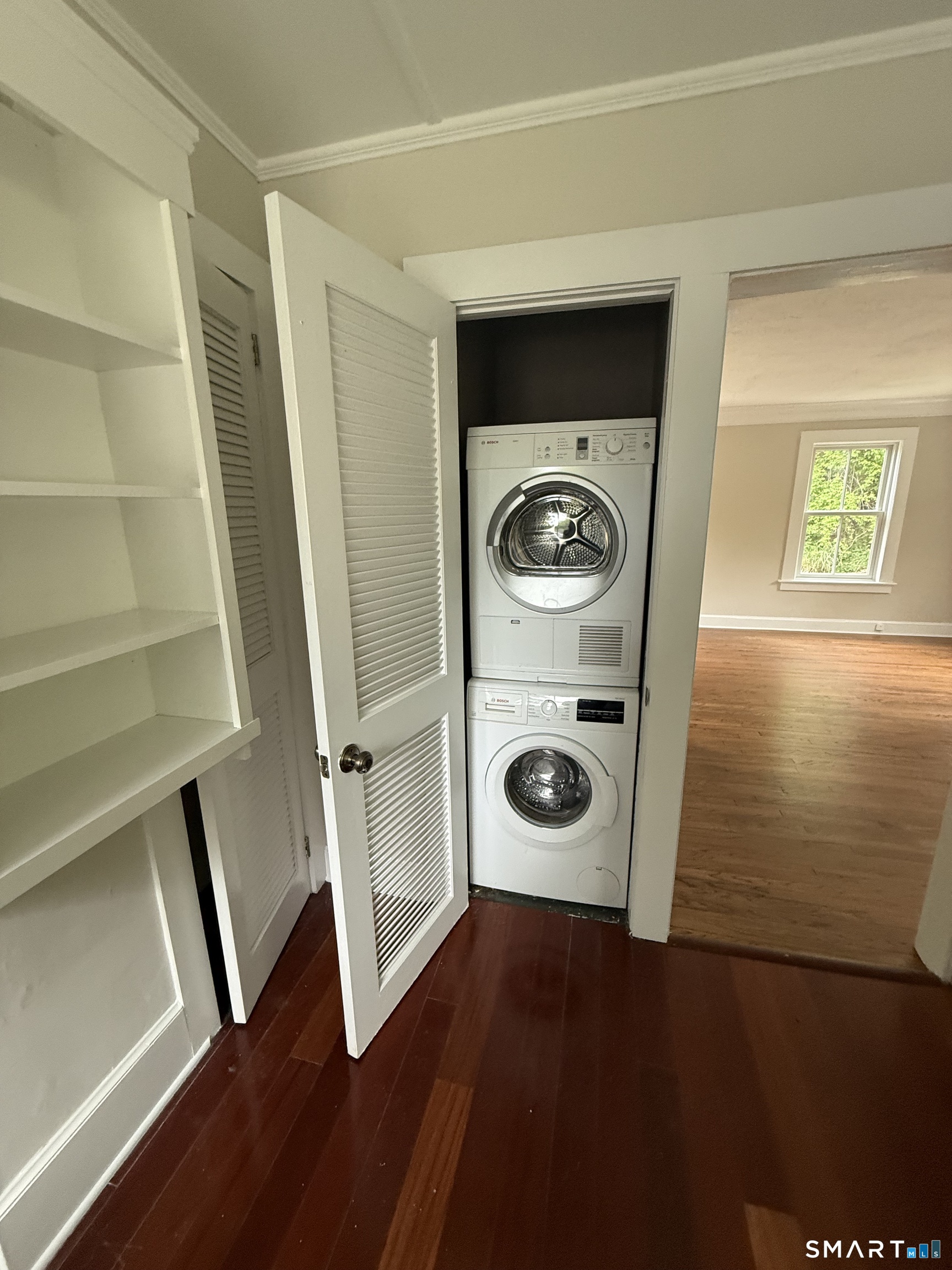 312 Ferry Road Old Lyme, CT 06371 - Photo 9 of 16 a view of a storage and utility room with washer and dryer