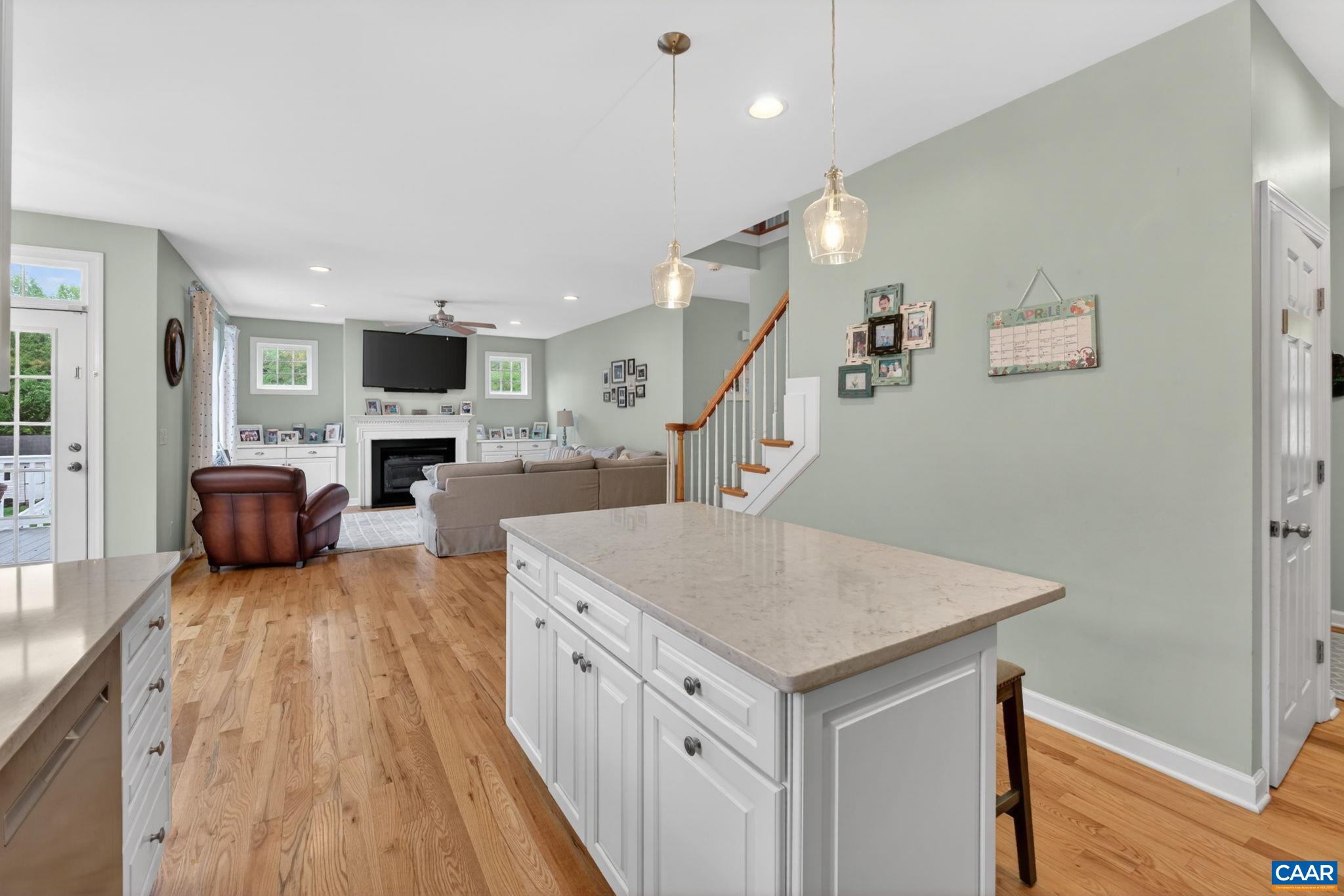 511 Taylor Ridge Way Palmyra, VA 22963 - Photo 19 of 57 a kitchen with sink microwave and stove