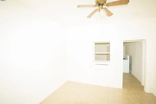 a view of a room with a fan