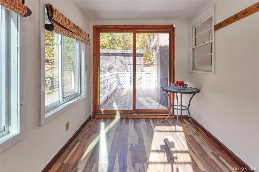 425 Spring Lake Road Red Hook, NY 12571 - Photo 8 of 23 a view of a room with wooden floor and furniture