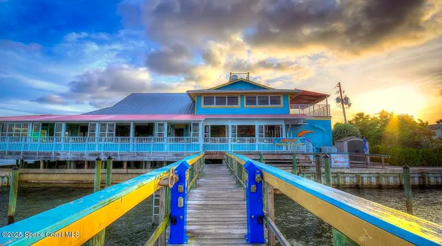 a front view of a house with swimming pool