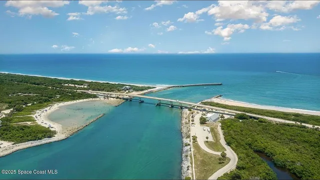 a sign on the side of a street