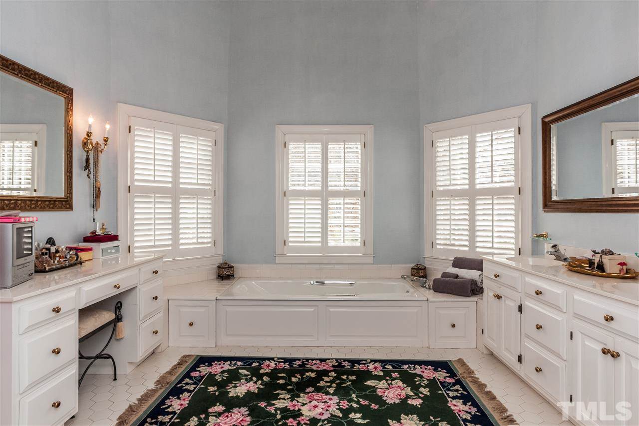 405 Lake Boone Trail Raleigh, NC 27608 - Photo 13 of 24 a kitchen with sink window and window