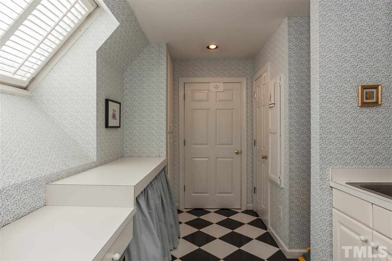 405 Lake Boone Trail Raleigh, NC 27608 - Photo 16 of 24 a bathroom with a sink and a shower