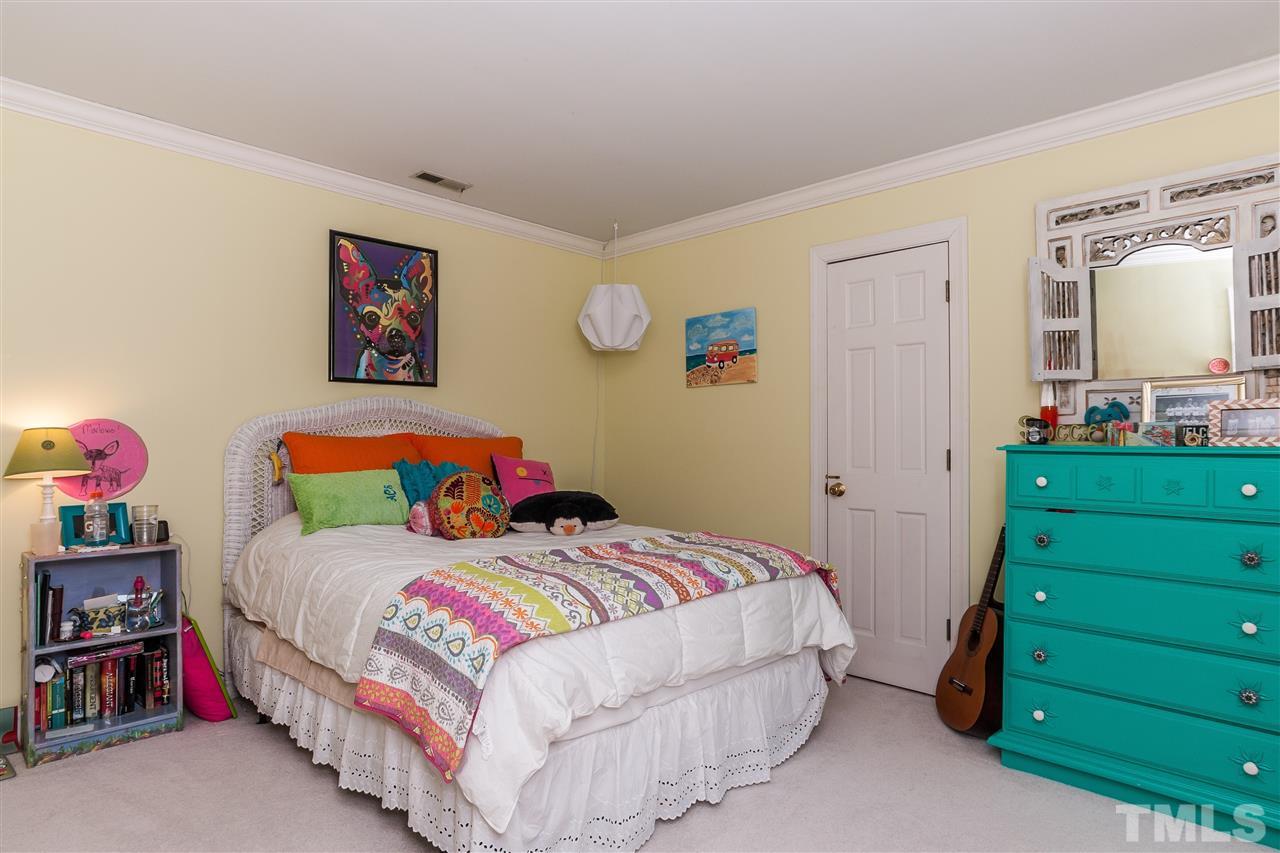 405 Lake Boone Trail Raleigh, NC 27608 - Photo 18 of 24 a bedroom with a bed and a closet