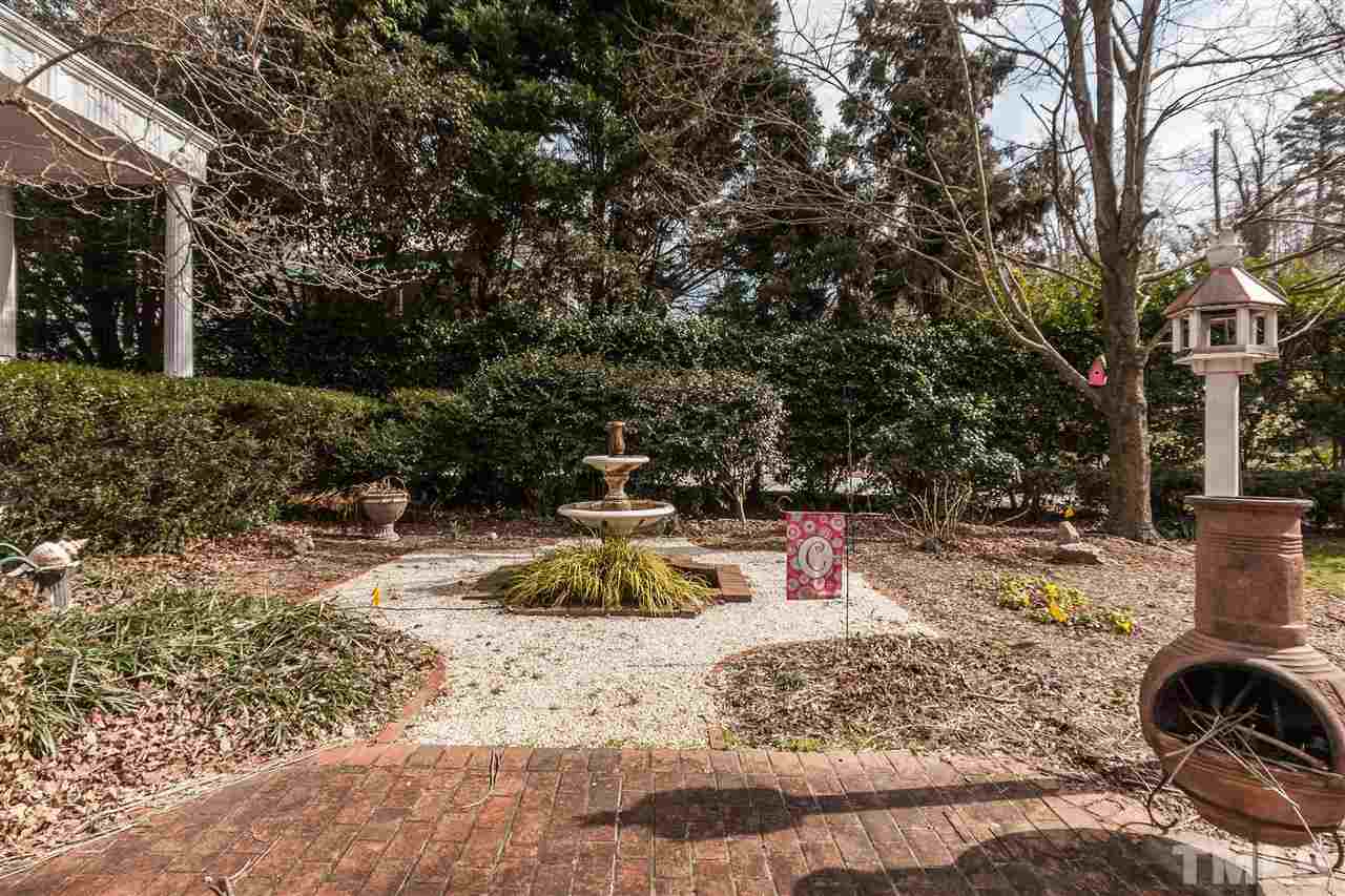 405 Lake Boone Trail Raleigh, NC 27608 - Photo 22 of 24 a view of a yard with a tree
